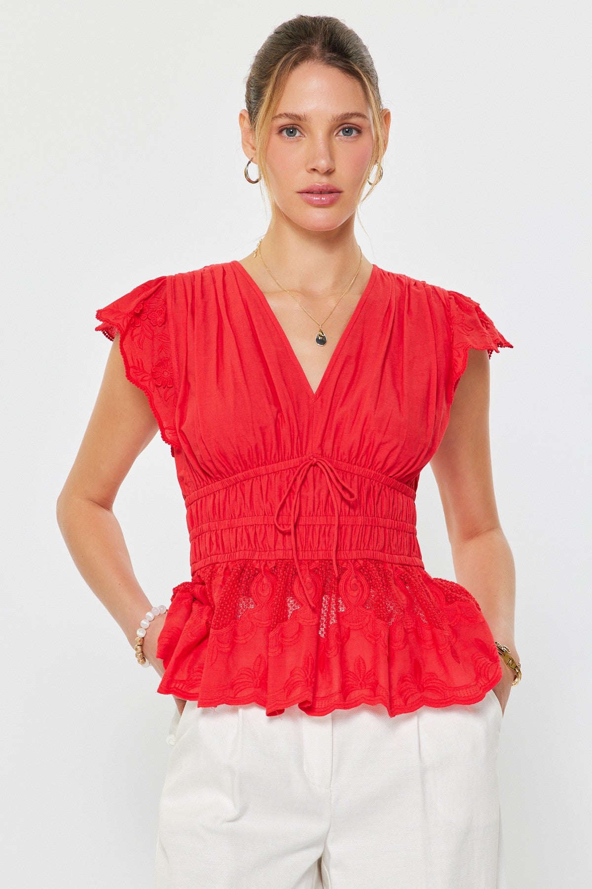 Embroidered Peplum V-neck Blouse