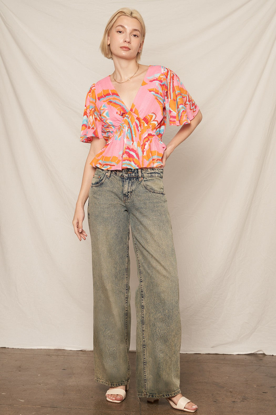 Flirt & Flutter V-Neck Top