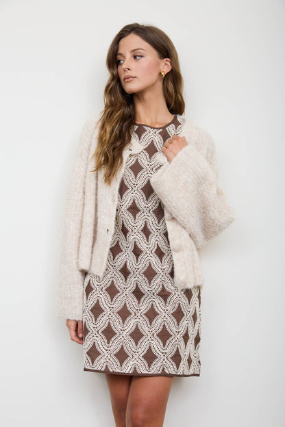 TEXTURED GEOMETRIC SLEEVELESS DRESS