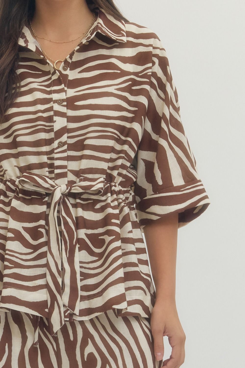 Zebra print button-front top